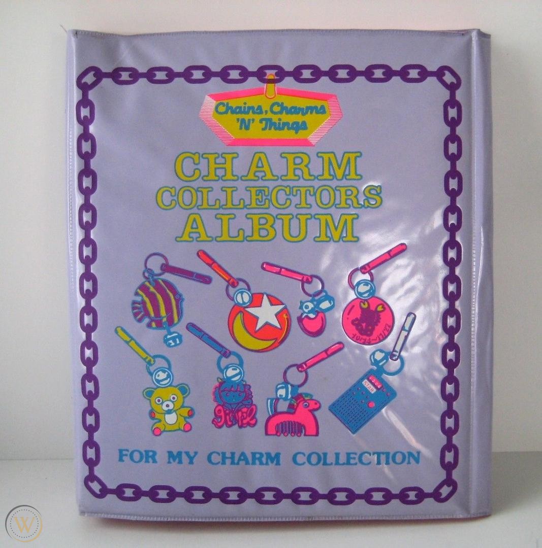 The cover of a storage binder for bell charms, reading “Chains, Charms ’N’ Things: Charm Collectors Album - For My Charm Collection”