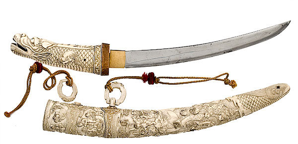 Japanese sword with a carved ivory handle and scabbard
