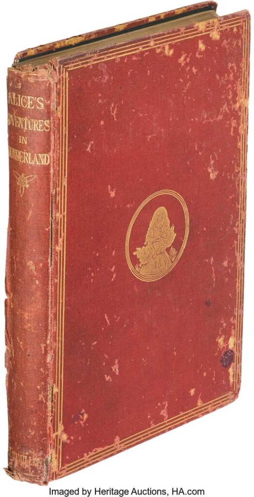 first-edition copy of Alice in Wonderland book